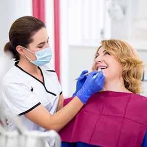 woman getting dental checkup 